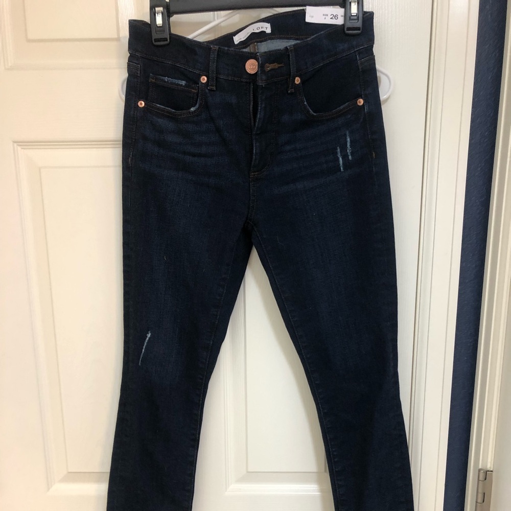 Loft dark denim jean with chewed hem